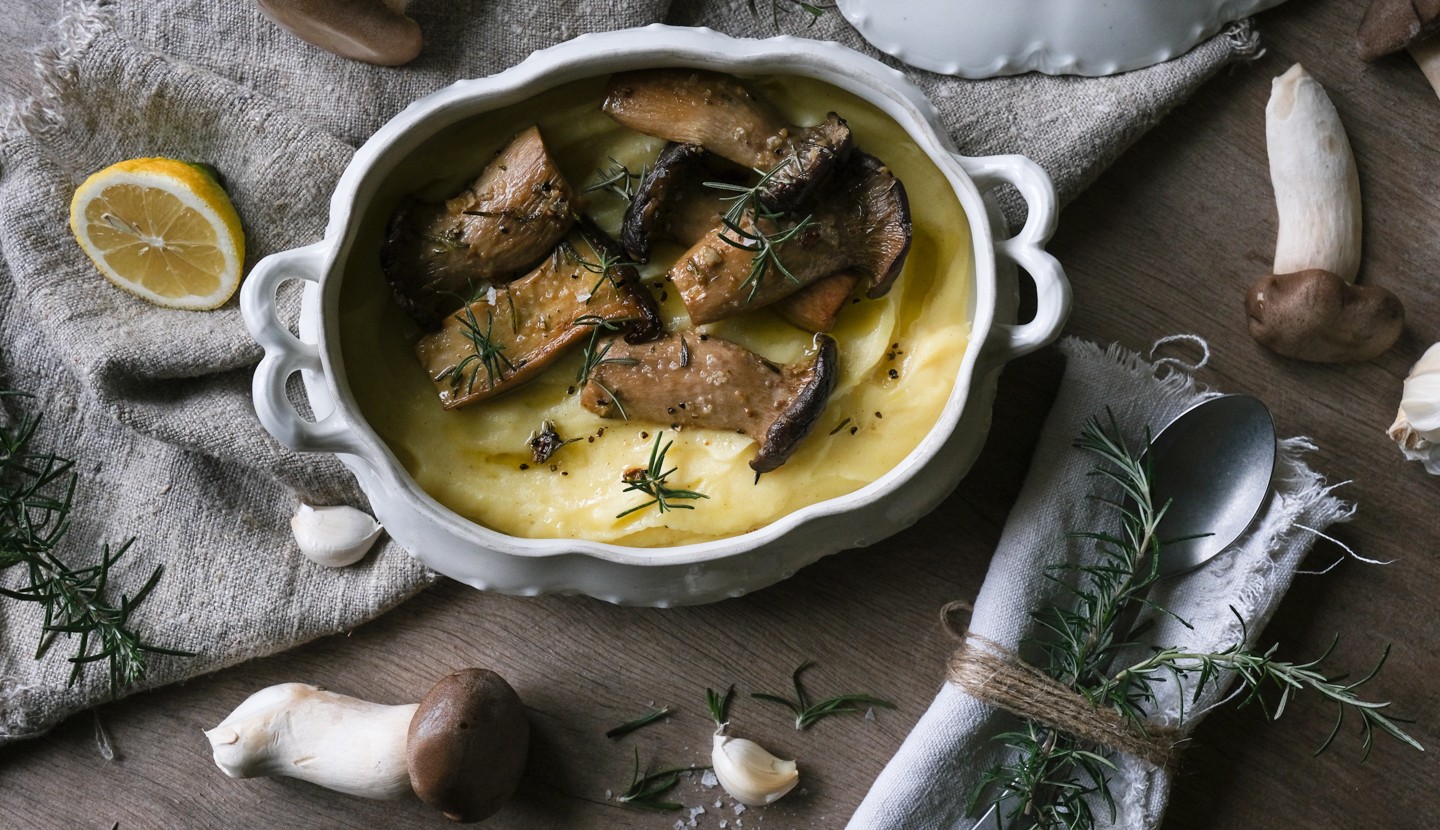 Grilled porcini mushrooms with potato purée and truffle oil